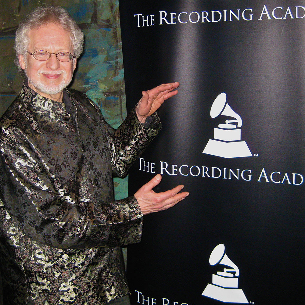Steven Halpern beside a Recording Academy display